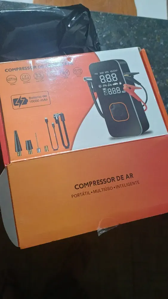 Auxiliar de partida de bateria veicular portátil com compressor de ar